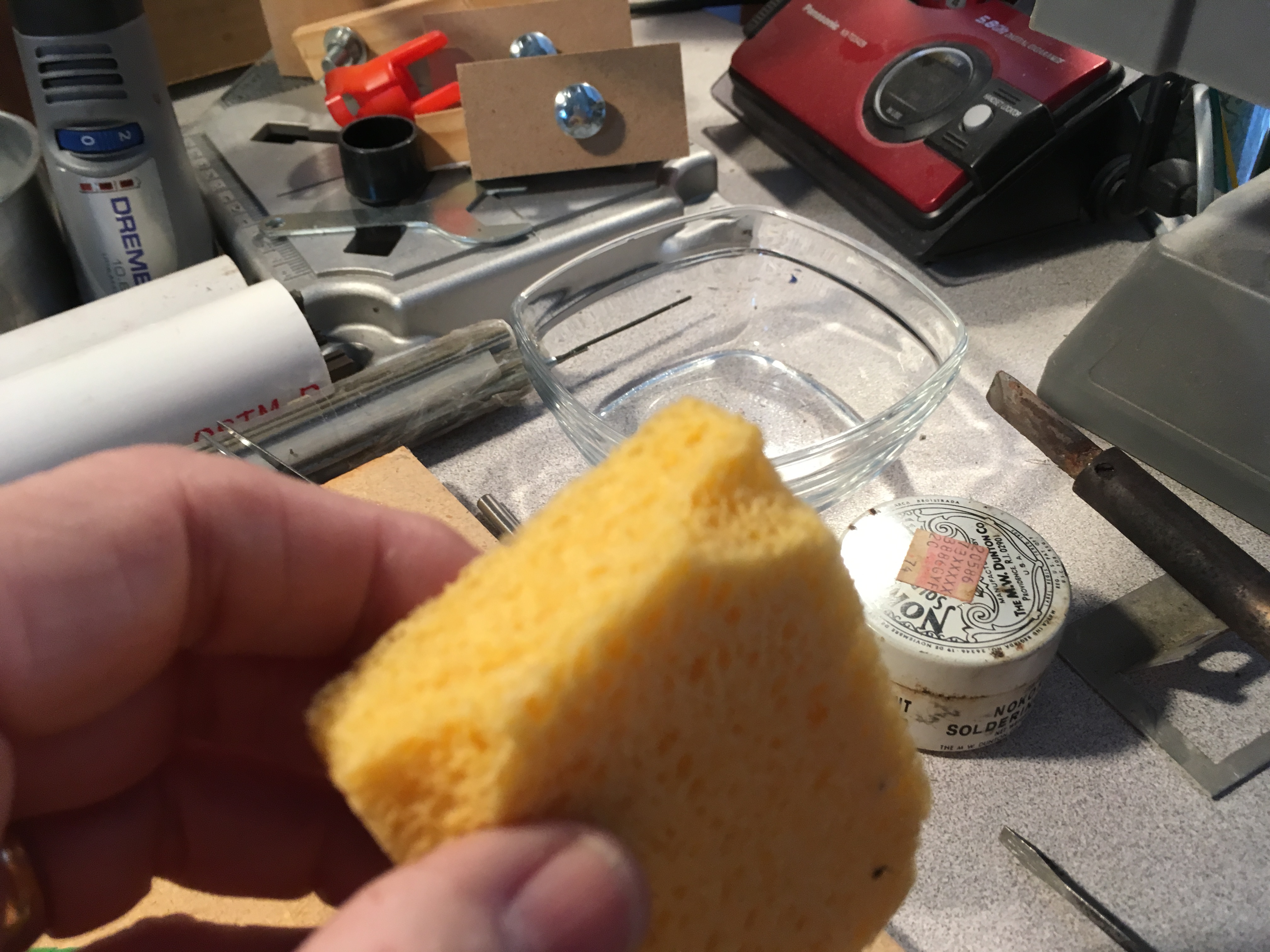 Sponge cut to fit dish